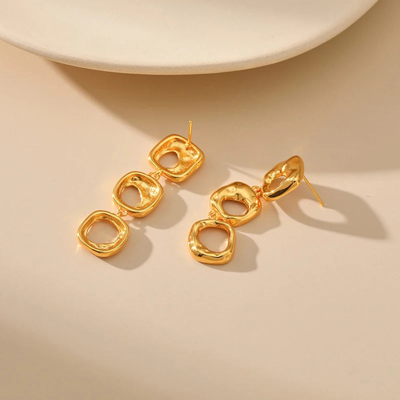Irregular hollow design niche heavy industry metal earrings brass plated 18K gold color retention long earrings