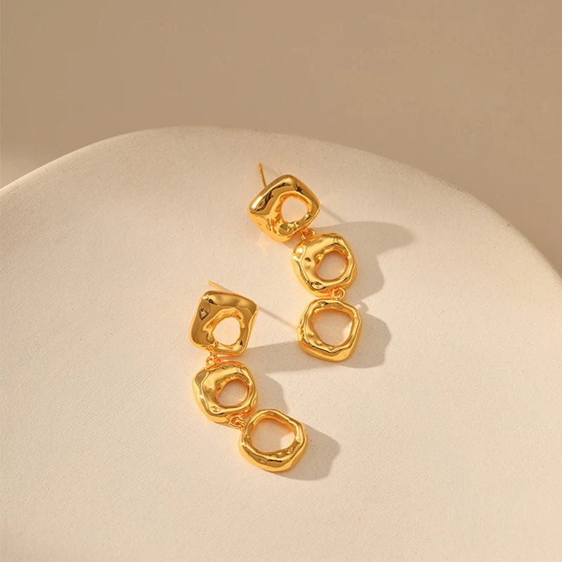 Irregular hollow design niche heavy industry metal earrings brass plated 18K gold color retention long earrings